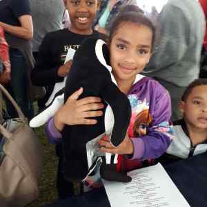 Hermanus Whale Festival - hug a penguin