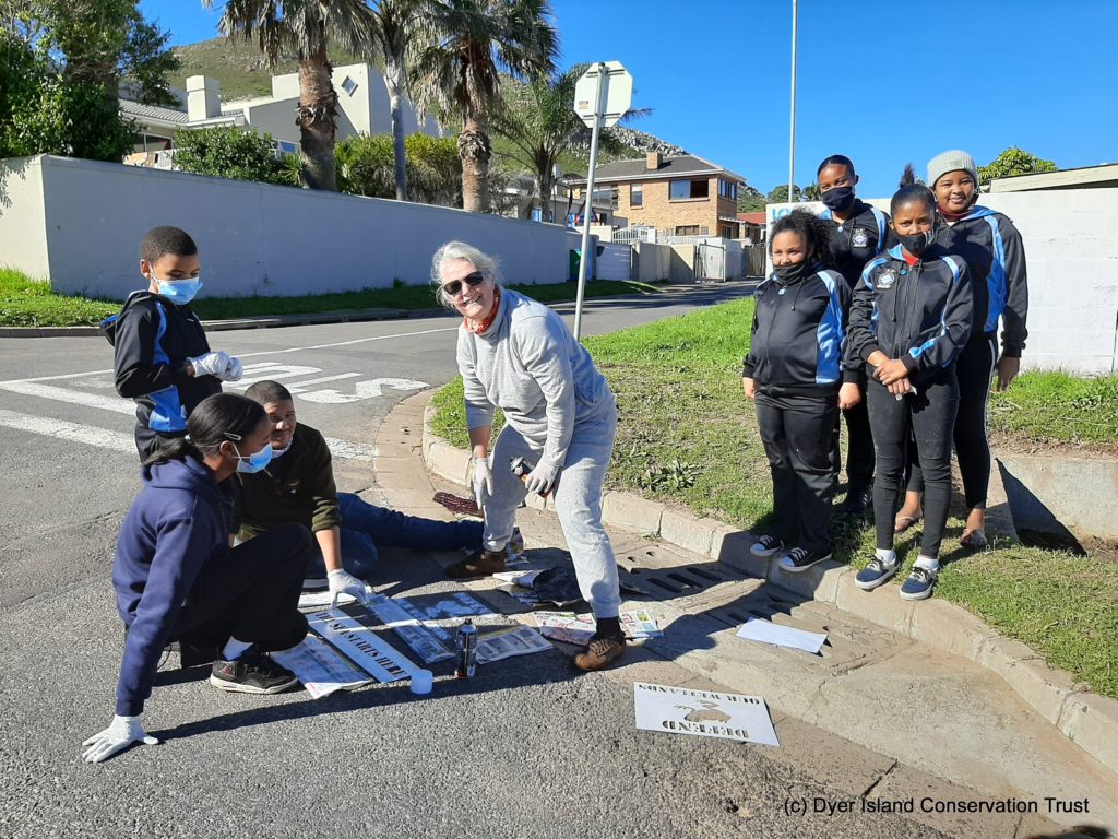 Sheraine Van Wyk Of Whale Coast Conservation Becoming A Master At Stencil Painting.